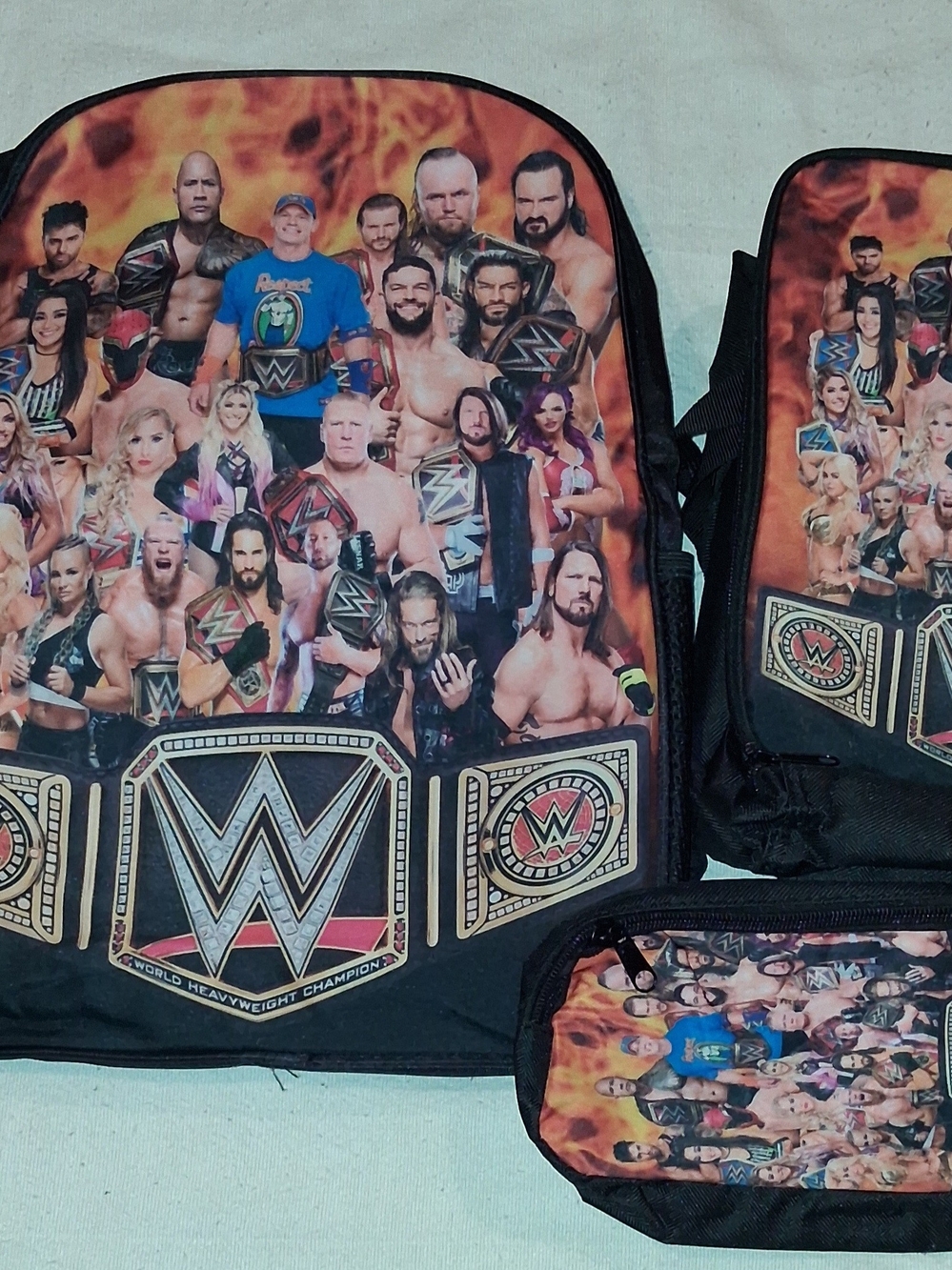 WWE Men's Backpack Set in Black and Orange Wrestling Roster Art